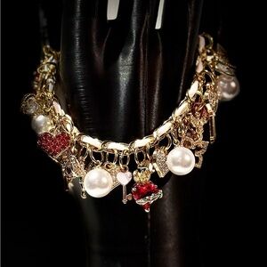 Gold and Red Cross and Angel Charm Bracelet
